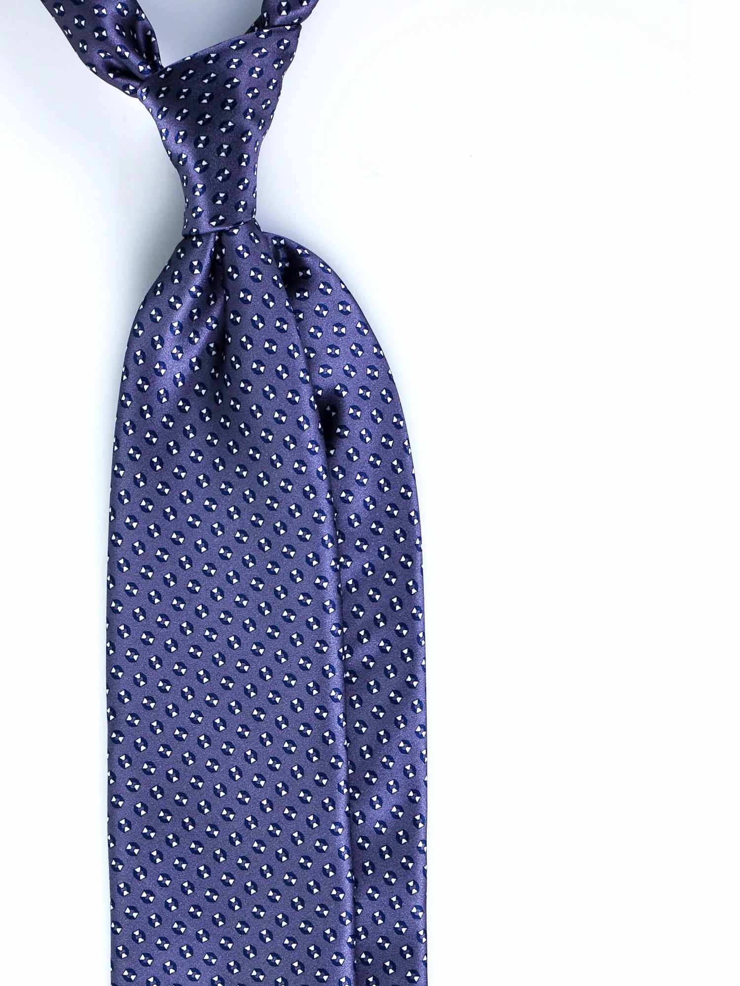 A dark grey satin silk tie with a repeating blue geometric pattern, neatly knotted and displayed against a bright white background. The tie exudes a formal and elegant tone. No visible text in the image.
